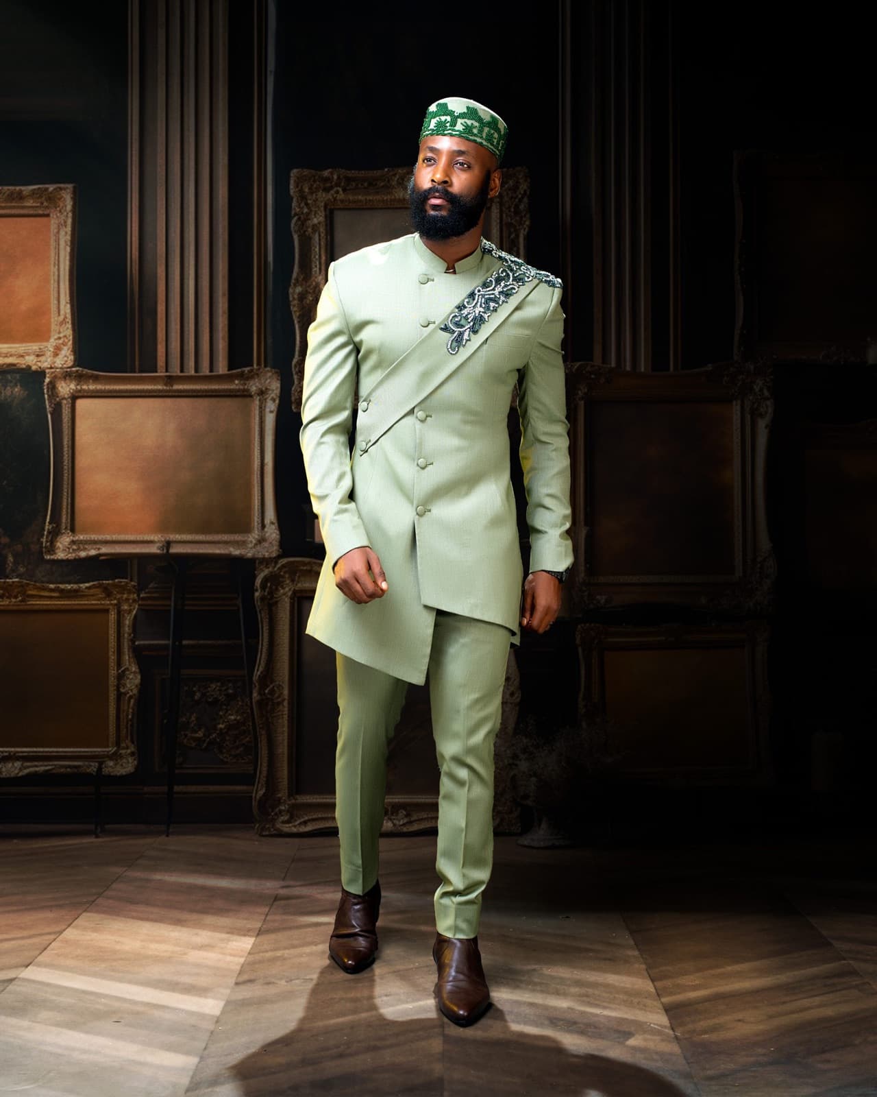 Green exclusive safari suit with beaded detailing.