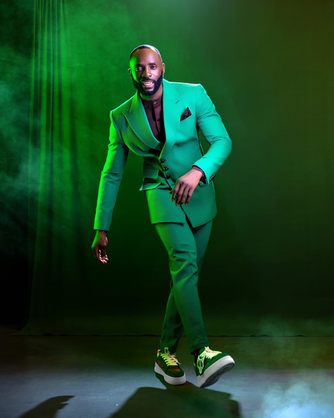 Green double-breasted suit.