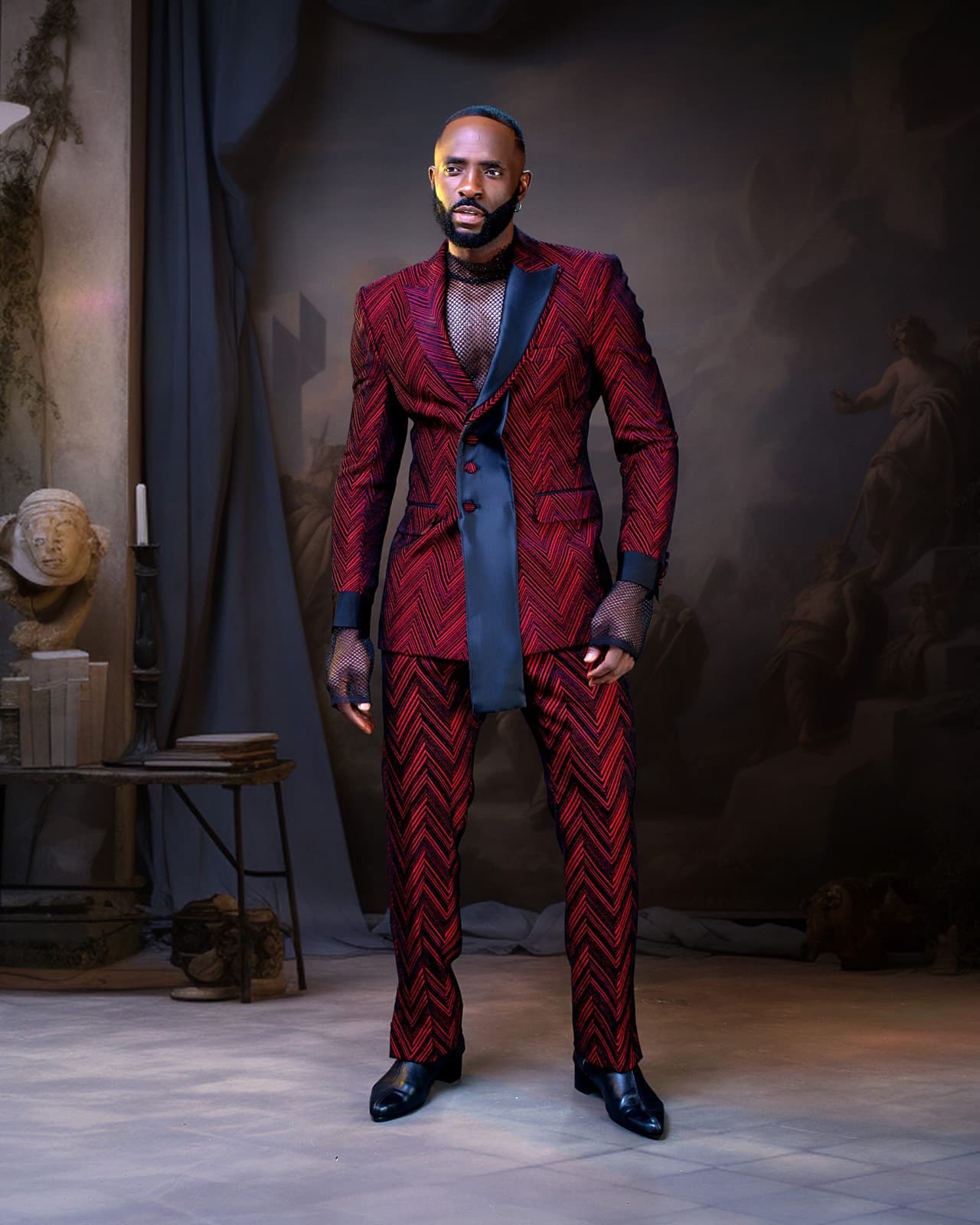 Velvet double-breasted banta suit in deep burgundy.